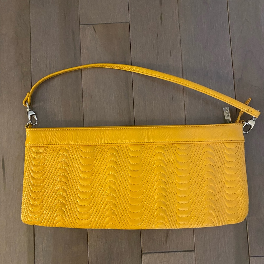 HOBO international. Quilted leather clutch with strap